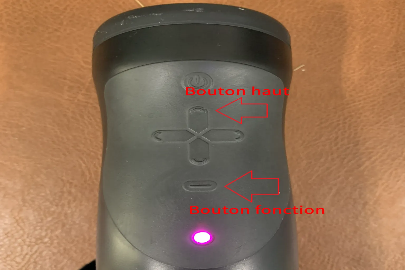 The Handy avec les boutons haut et fonction indiqués en français.