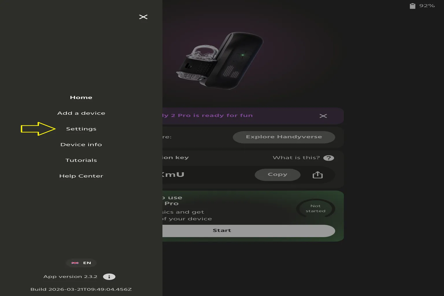 Menu principal de l’application The Handy avec une flèche pointant vers l’option Settings.